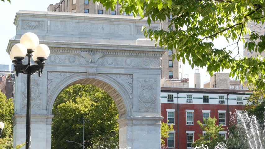 New York City Manhattan Washington Square Park arch, United States. Marble historic monument Greenwich Village. 5 fifth avenue triumphal arch. Autumn fall garden greenery. George Washington memorial.