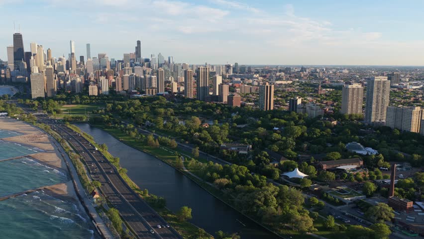 Golden hour illuminating Chicago skyline with Lincoln Park, North Avenue Beach, Lake Shore Drive, and Lake Michigan, urban architecture and natural landscapes