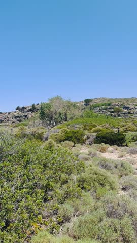 The mountainous terrain of Crete, Greece, featuring an incredible wild landscape and a cycling path—an active getaway for tourists.