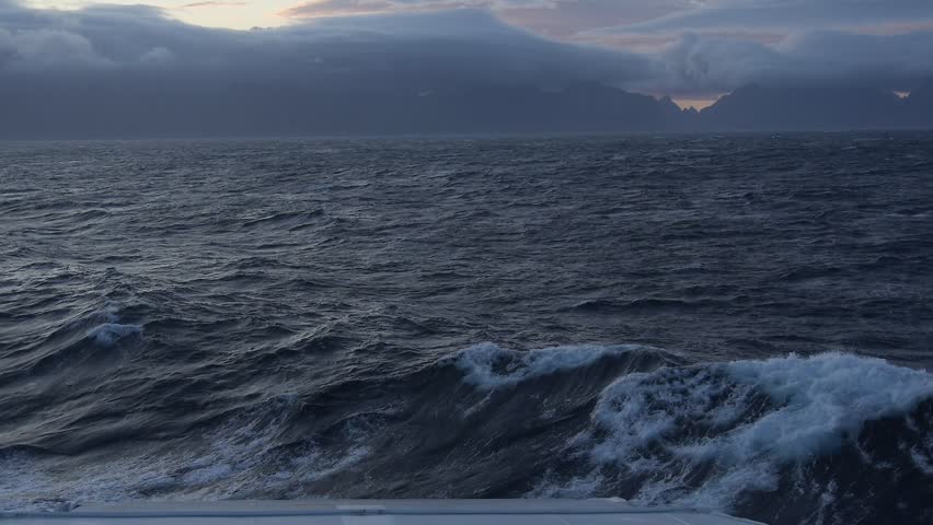 Lofoten, Norway. The beautiful dramatic waves sea view and cloudy sky in Lofoten.	