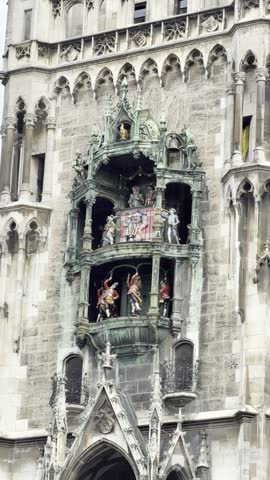 The Glockenspiel carillon with its animated figures turning on the tower of the New Town Hall at Marienplatz in Munich, Bavaria, Germany