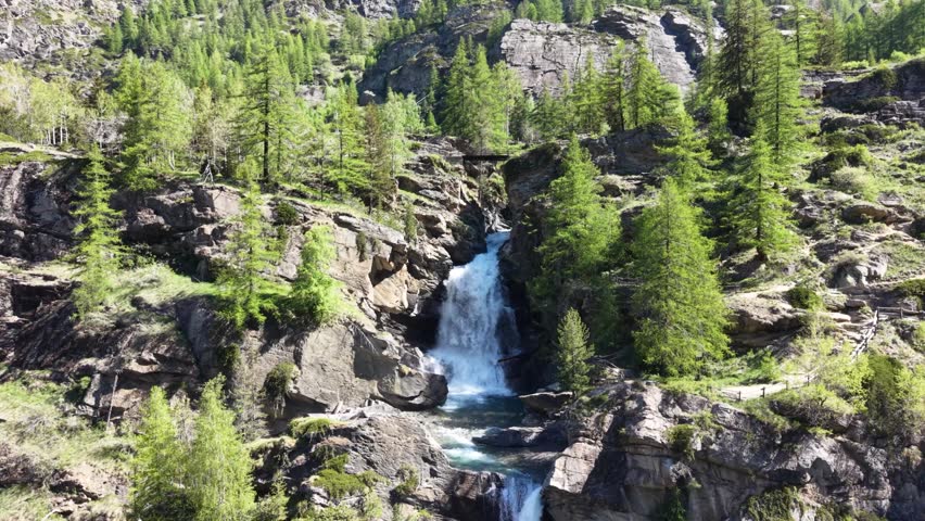 Cascades de Lillaz waterfall and pine forest