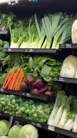 Fresh organic vegetables displayed in grocery store