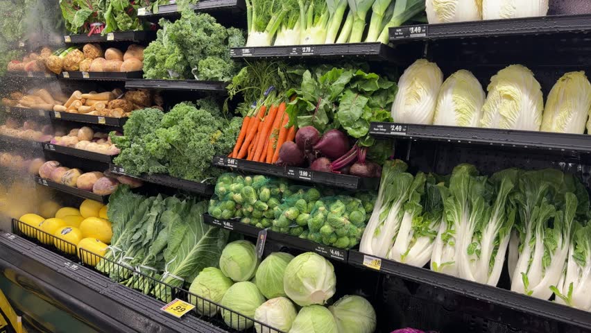 Fresh vegetables display with misting system in a supermarket