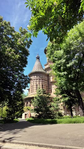 Vertical view highlighting the patterned tiles architecture of the Romanian Orthodox Metropolitan Cathedral in central Timisoara.