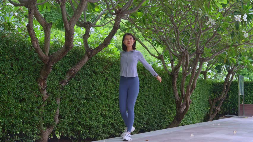 Asian sport woman stretching outdoor