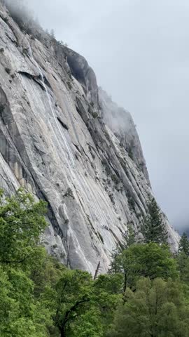 mountains in clouds or fog, Yosemite National Park, California, USA