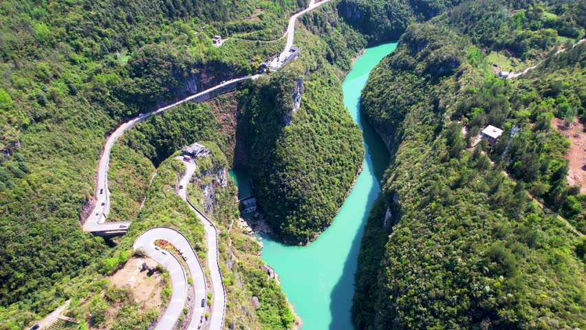 4K Aerial Video of Natural Mountain Peaks, Green Hills and Clear Waters