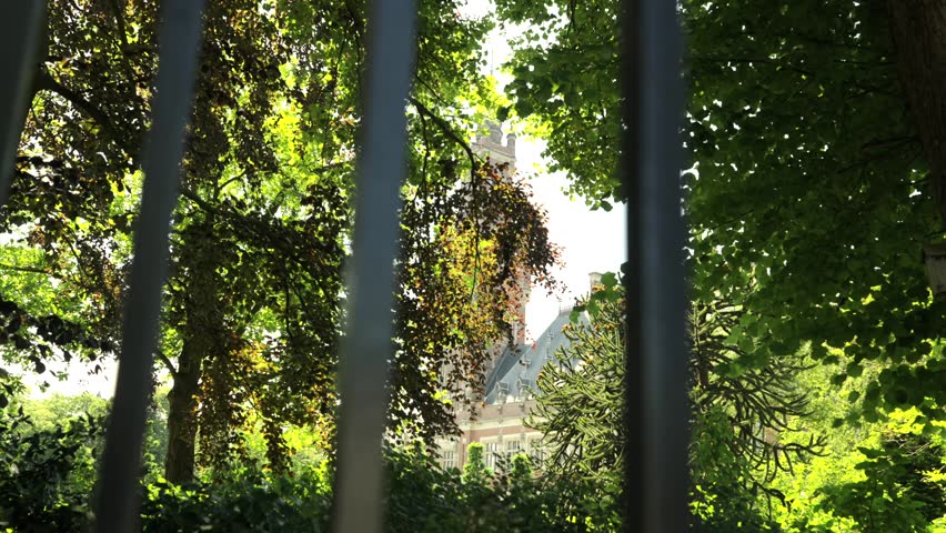 Peace Palace Tower Framed By Trees In The Hague Netherlands