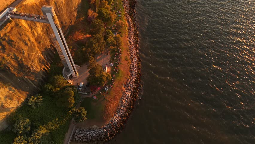 Top Down Aerial View of Boca do Vento Elevator Cliff and Tagus River at Sunset