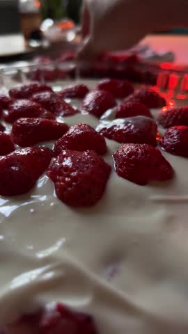 Making Homemade Strawberry Pie by Arranging Fresh Strawberry Halves