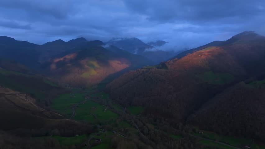 Aerial view from a drone of the winter landscape around the village of Vega de Pas. Pasiegos Valleys region, Cantabria, Spain, Europe