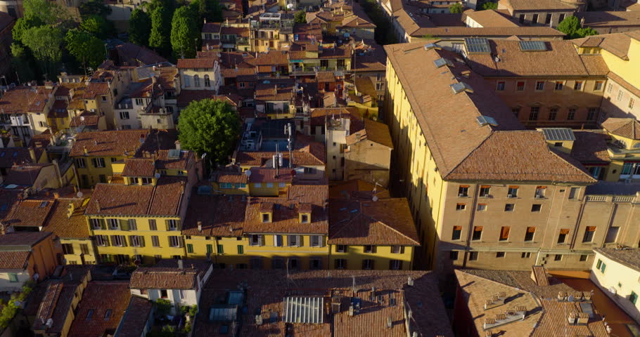 Medieval Buildings With Red Terracotta-Tiled Roofs In Bologna, Italy. - aerial shot