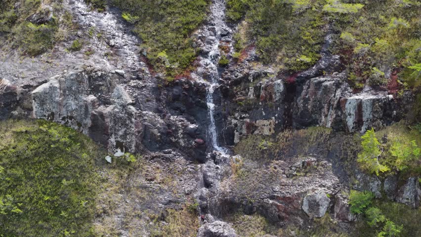 Majestic Waterfall Cascading Down a Rocky Cliff in British Columbia, Canada