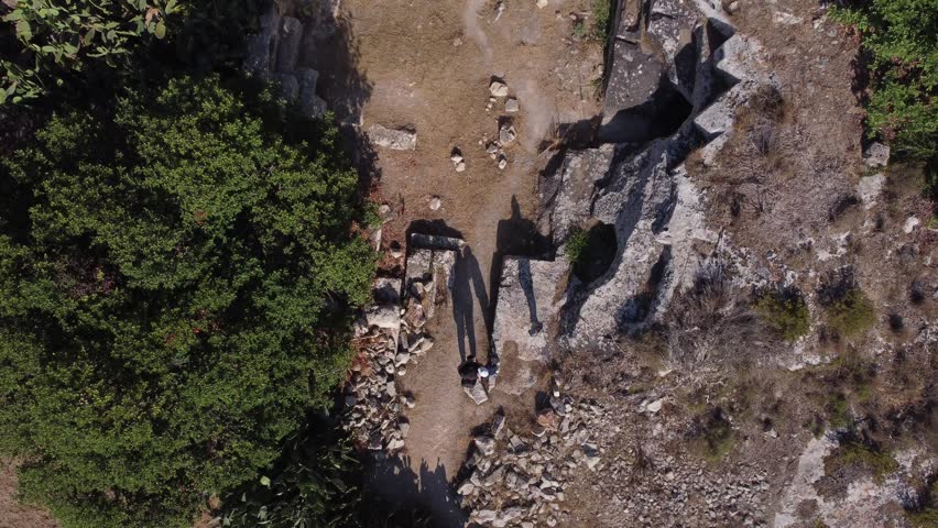 Naxar, Malta 01.07.2026 - Salini Catacombs aerial view of the field. This group of burials is situated in an area known as Ta Latnija. High quality 4k footage