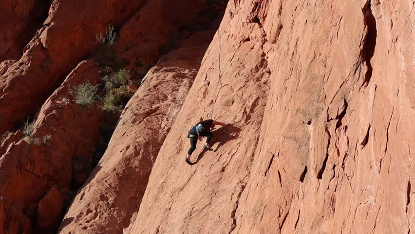 Climber on Red Rock Formations in Garden of the Gods