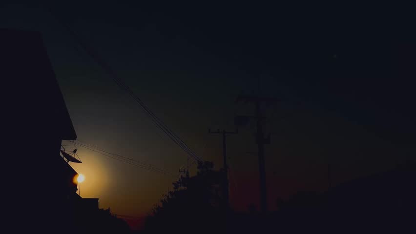 Silhouette of urban buildings at dusk