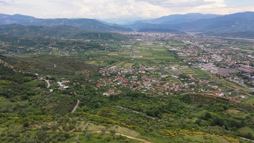 Drone Pull Back From Winding Road Above Elbasan Albania