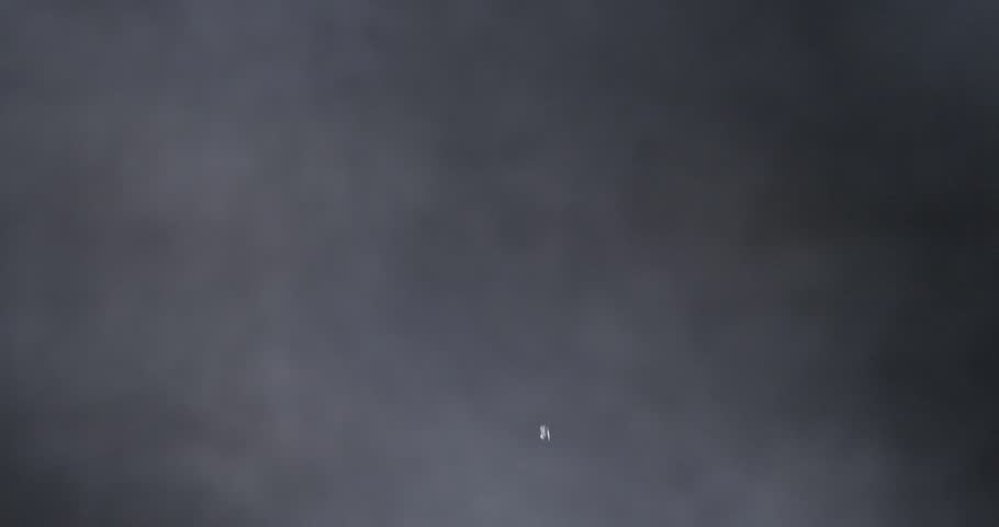 Strawberries with water splashes falling in super slow motion