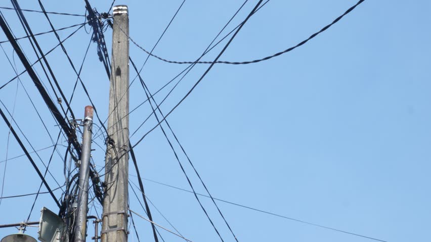 Utility Pole With Overhead Power Lines Against Clear Blue Sky, Urban Infrastructure Background