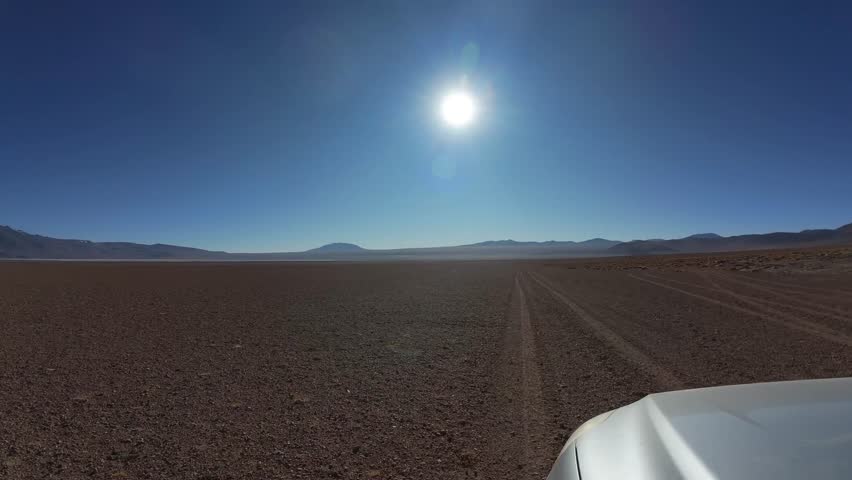 Driving Toward The Sun Across The Bolivian Altiplano On The Laguna Route