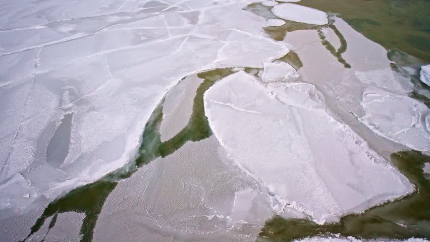 Aerial winter view of frozen ice pieces scattered across Lake Superior.