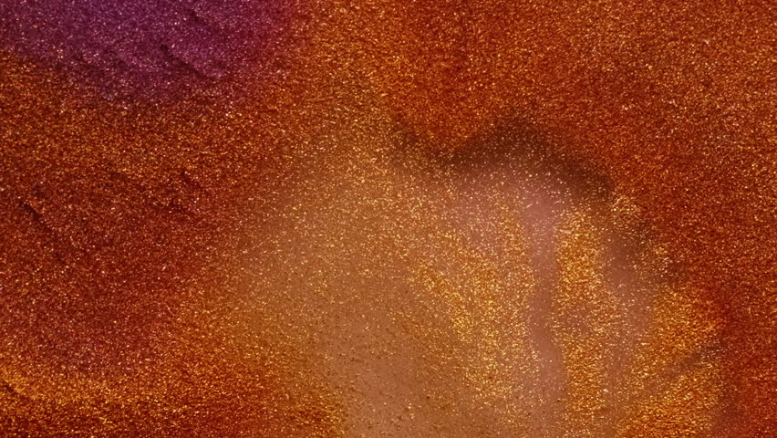 Shimmer ink mix. Glitter texture. Defocused purple orange colorful chemical droplet liquid leaking on abstract acrylic art background.