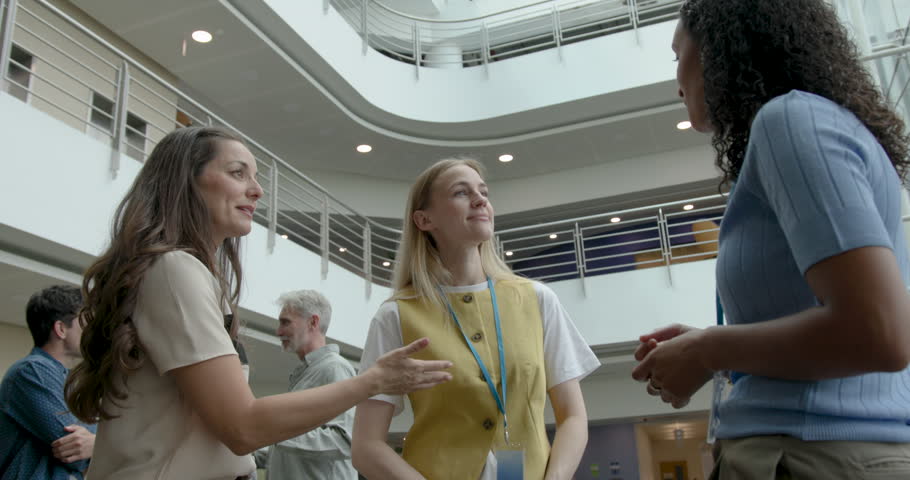 Business Women Meeting in Office Lobby and Shaking hands during introduction