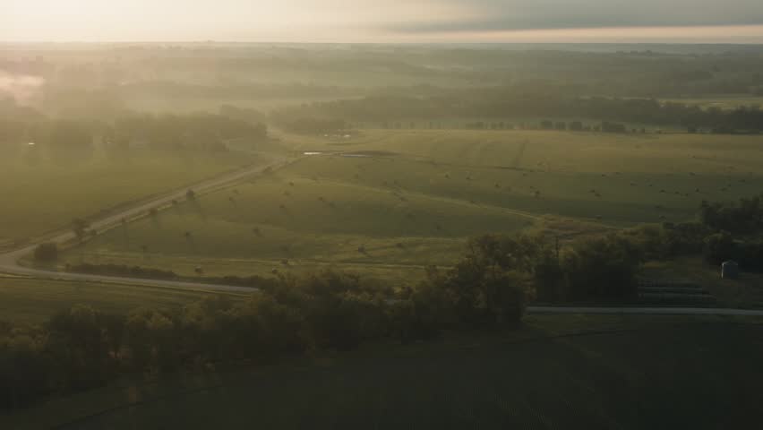 Sunset over rural land in Iowa