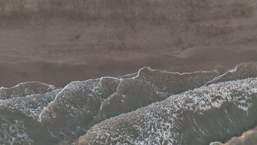  close up view of the textured surface of a frozen lake in winter.