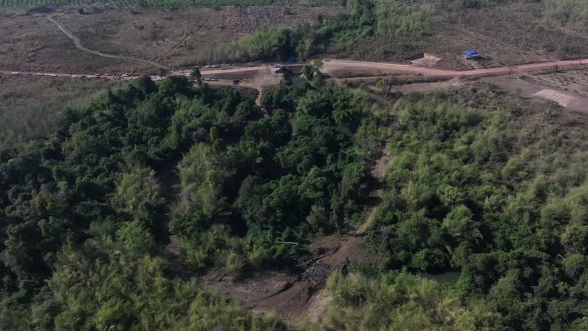 Drone video in Mondulkiri province, views of mountains, forests, roads, villages and lakes Ratanakiri, Kon Mom District, has a very beautiful landscape.