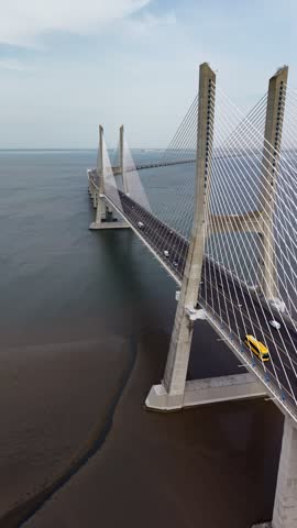 Aerial drone footage of Vasco da Gama Bridge in Lisbon, Portugal