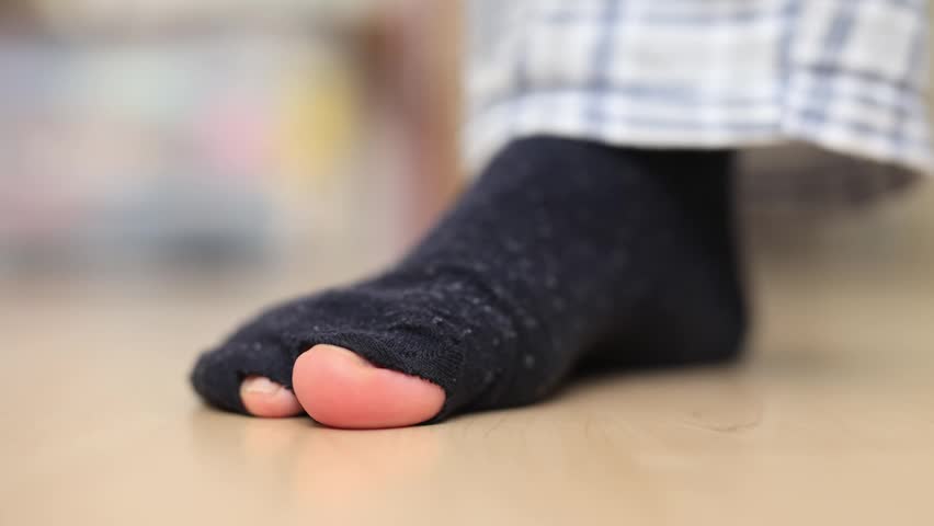 A realistic close-up shot of a homeless man