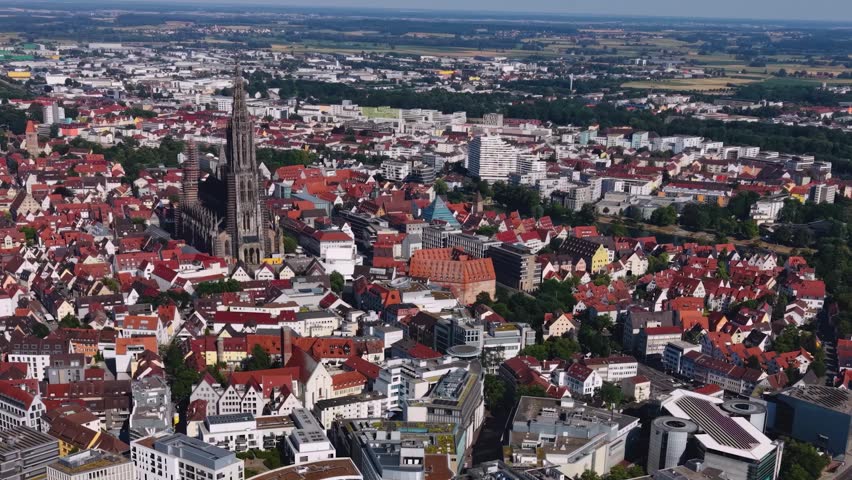 Aerial view around the old town and the  Münster cathedral of the city Ulm in Germany on a sunny summer noon.