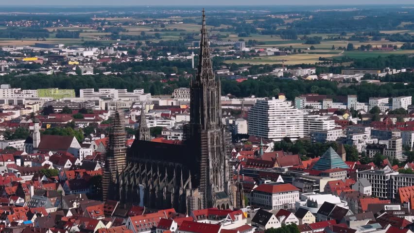 Aerial view around the old town and the  Münster cathedral of the city Ulm in Germany on a sunny summer noon.