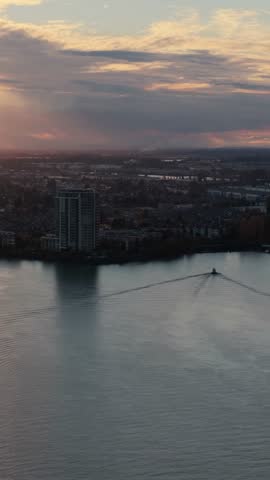 Golden Sunset Reflecting on Fraser River with New Westminster City, British Columbia, Canada