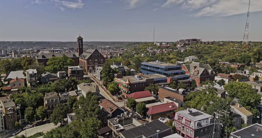 Cincinnati Ohio Aerial v77 drone fly around the Monastery Event Center on St Paul Place in Mt Adams neighborhood against Cincy downtown cityscape - Shot with 8k camera