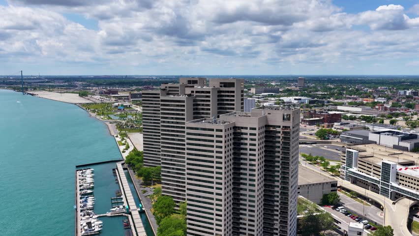 Aerial footage of Skyscrapers and office buildings in the skyline in Detroit Michigan USA