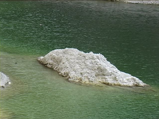 A view of a lake in a natural park.