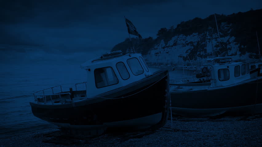Fishing Boats On The Shore At Night
