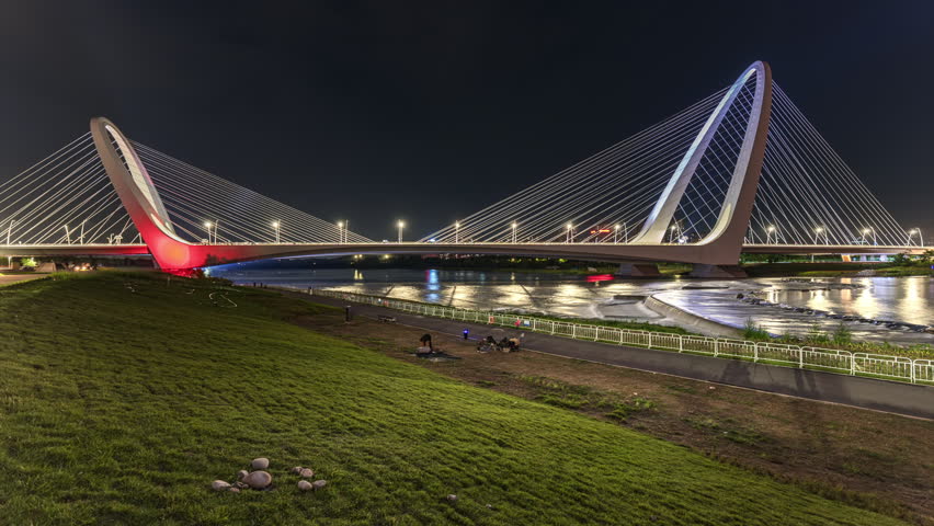 The Yongding River at night near the new Shougang Bridge in Shijingshan District, Beijing, China