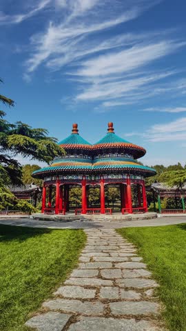 Timelapse footage of the Double Ring Pavilion at the Temple of Heaven in Beijing, China, with clouds moving above traditional Chinese architecture.