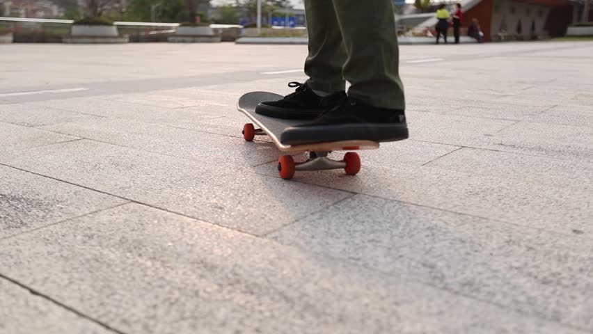 Skateboarder skateboarding outdoors in city	