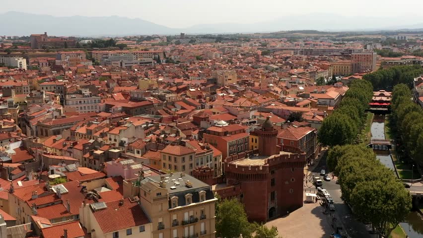 Daytime drone shot of the city of Perpignan