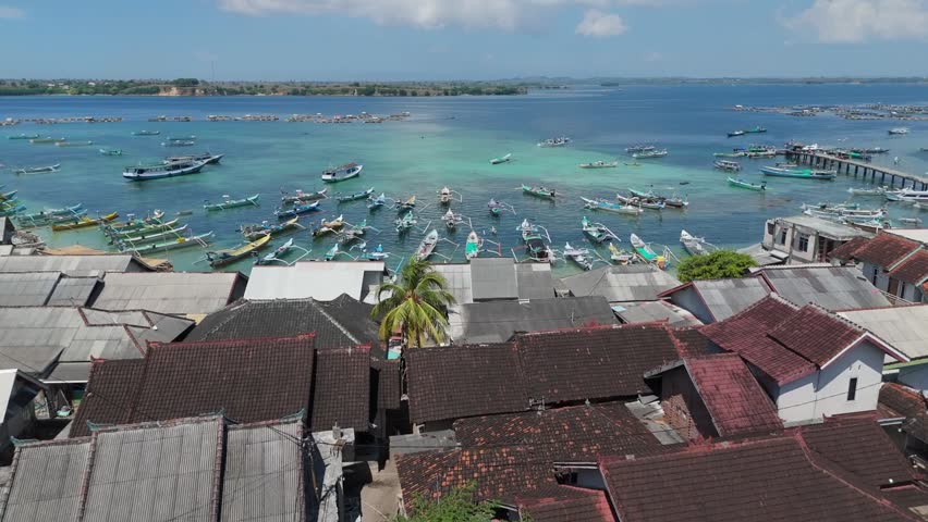 A row of boats along the shore