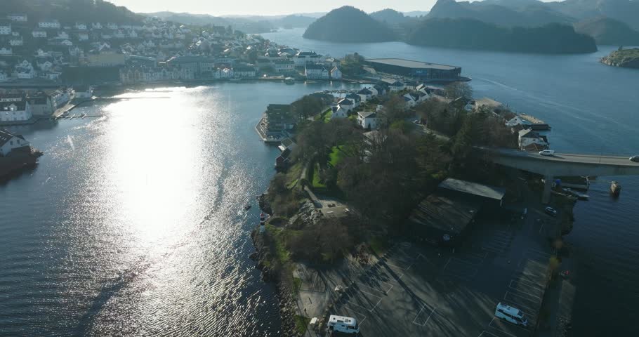 Aerial view of Farsund coastal town Norway with waterfront in slow motion