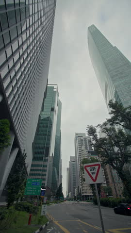 Modern cityscape of Singapore City featuring glass skyscrapers in the financial business district with vibrant streets contemporary architecture and tourism in Asia