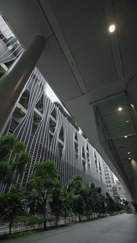 Scenic cityscape of Singapore featuring a garden city business center tropical landscaping modern glass skyscrapers and financial office buildings in Asia