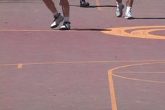 Two clips - Group of older men play basketball at park with soft focus for background concept, great for text or titles and court surface shot.
