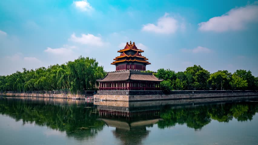 Daytime panoramic timelapse of the historic Forbidden City and its iconic Corner Tower in Beijing, China.